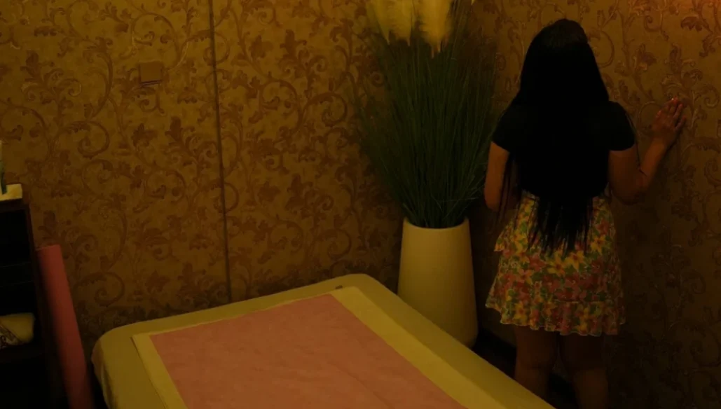 Therapist performing a full body massage in a private treatment room at Chameli Spa Ajman