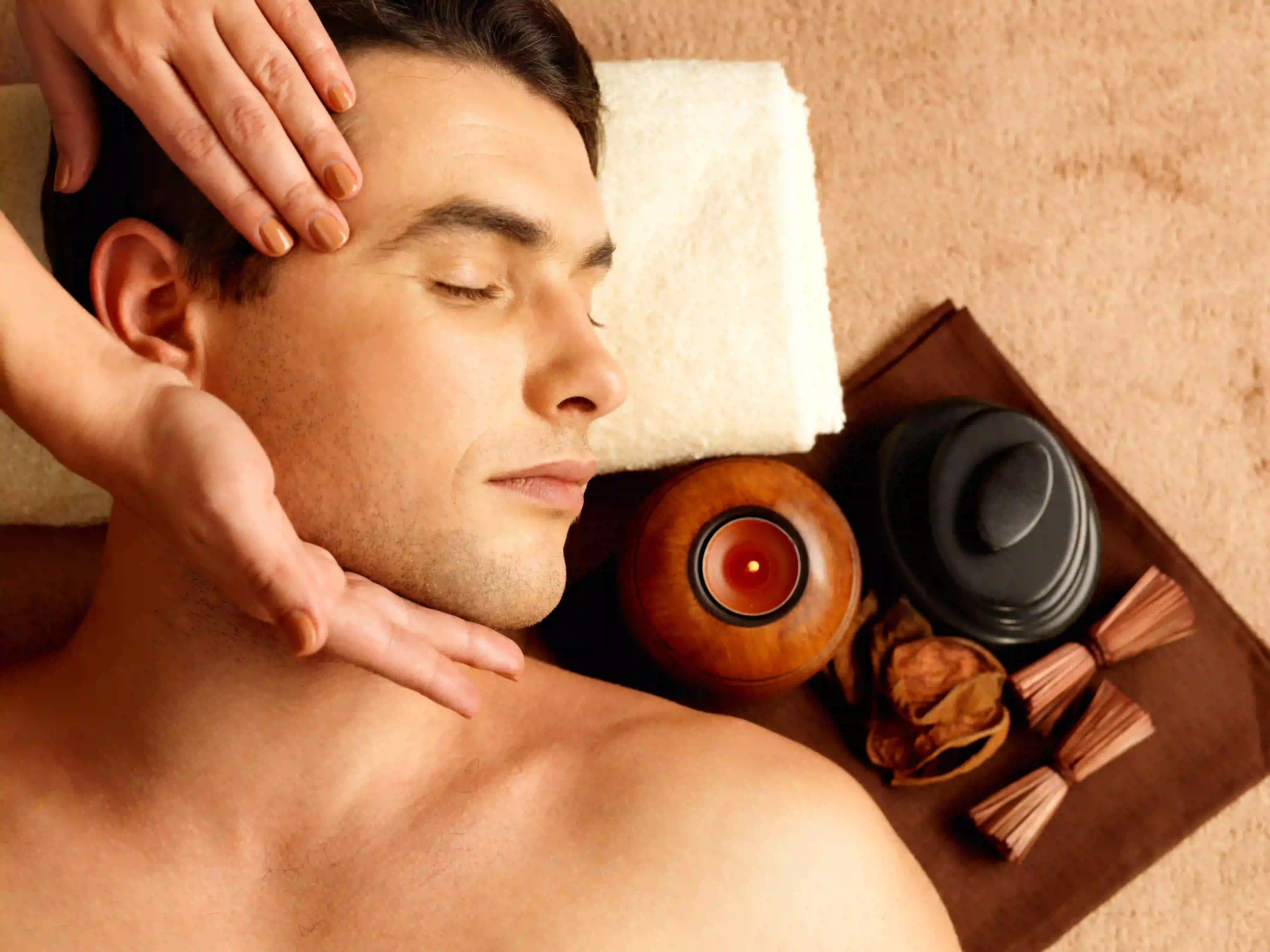 man enjoying kerala massage to massage