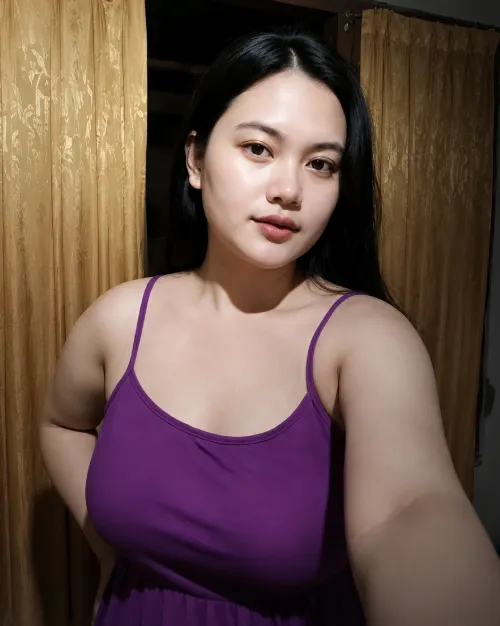  Massage Spa in ajman pink color dressed girl side pose on wall