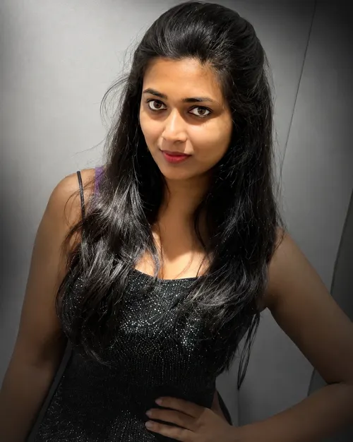 Massage Spa in Ajman girl in saree on terrace of her home